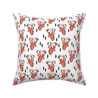 geo deer head // bright orange fabric deer head geometric design andrea lauren fabric