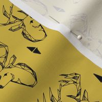 geo deer head // mustard yellow deer fabric andrea lauren baby nursery design