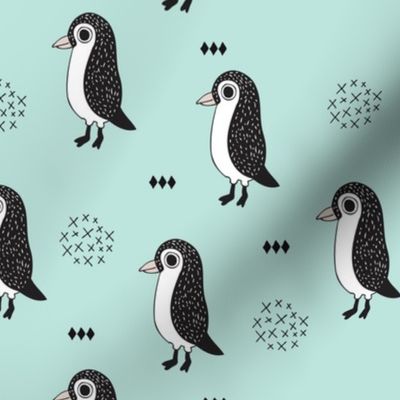 Adorable baby penguin geometric birds illustration and cross and arrow details pattern winter mint blue