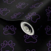 Pawprint Outline Polka dots - 1 inch (2.54cm) - Mid Purple (#a25bb1) on Black (#000000)