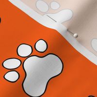 Pawprint Polka dots - 1 inch (2.54cm) - White (#FFFFFF) on Mid Orange (#FF5F00)