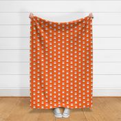 Pawprint Polka dots - 1 inch (2.54cm) - White (#FFFFFF) on Mid Orange (#FF5F00)