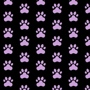 Pawprint Polka dots - 1 inch (2.54cm) - Pale Purple (#CB9FD9) on Black (#000000)