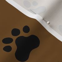 Pawprint Polka dots - 1 inch (2.54cm) - Black (#000000) on Dark Brown (#6E4A1C)