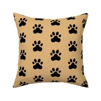 Pawprint Polka dots - 1 inch (2.54cm) - Black (#000000) on Light Brown (#E0B67C) 