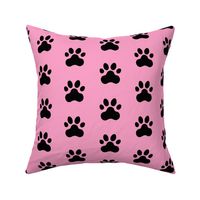 Pawprint Polka dots - 1 inch (2.54cm) - Black (#000000) on Light Pink (#FBA0C6)