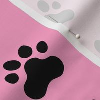 Pawprint Polka dots - 1 inch (2.54cm) - Black (#000000) on Light Pink (#FBA0C6)