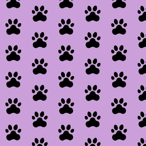 Pawprint Polka dots - 1 inch (2.54cm) - Black (#000000) on Pale Purple (#CB9FD9)