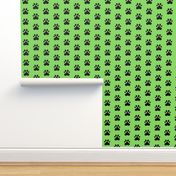 Pawprint Polka dots - 1 inch (2.54cm) - Black (#000000) on Light Green (#89DA65)