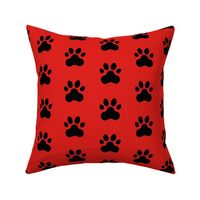 Pawprint Polka dots - 1 inch (2.54cm) - Black (#000000) on Red (#E0201B)