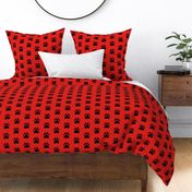 Pawprint Polka dots - 1 inch (2.54cm) - Black (#000000) on Red (#E0201B)