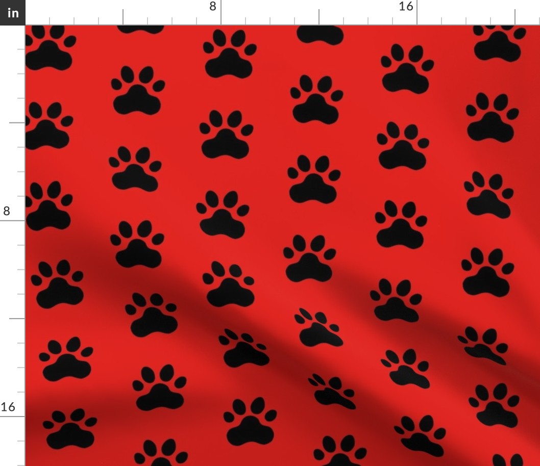 Pawprint Polka dots - 1 inch (2.54cm) - Black (#000000) on Red (#E0201B)