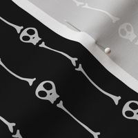 skull and bones in white on black