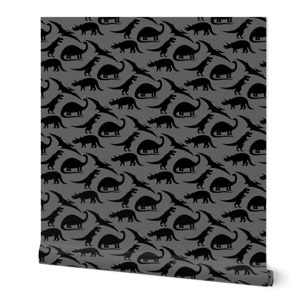 dinosaurs in black on charcoal grey