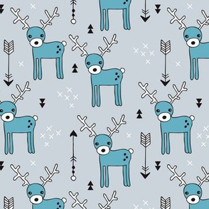 Adorable woodland reindeer and arrows christmas illustration kids pattern design in soft winter blue