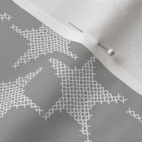 cross stitch stars on grey