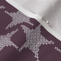 cross stitch stars on deep purple