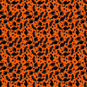 black cats and spiders on orange