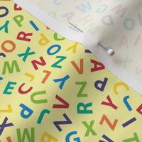 rainbow ditsy alphabet on pale gold