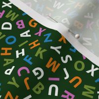 ditsy alphabet on forest green