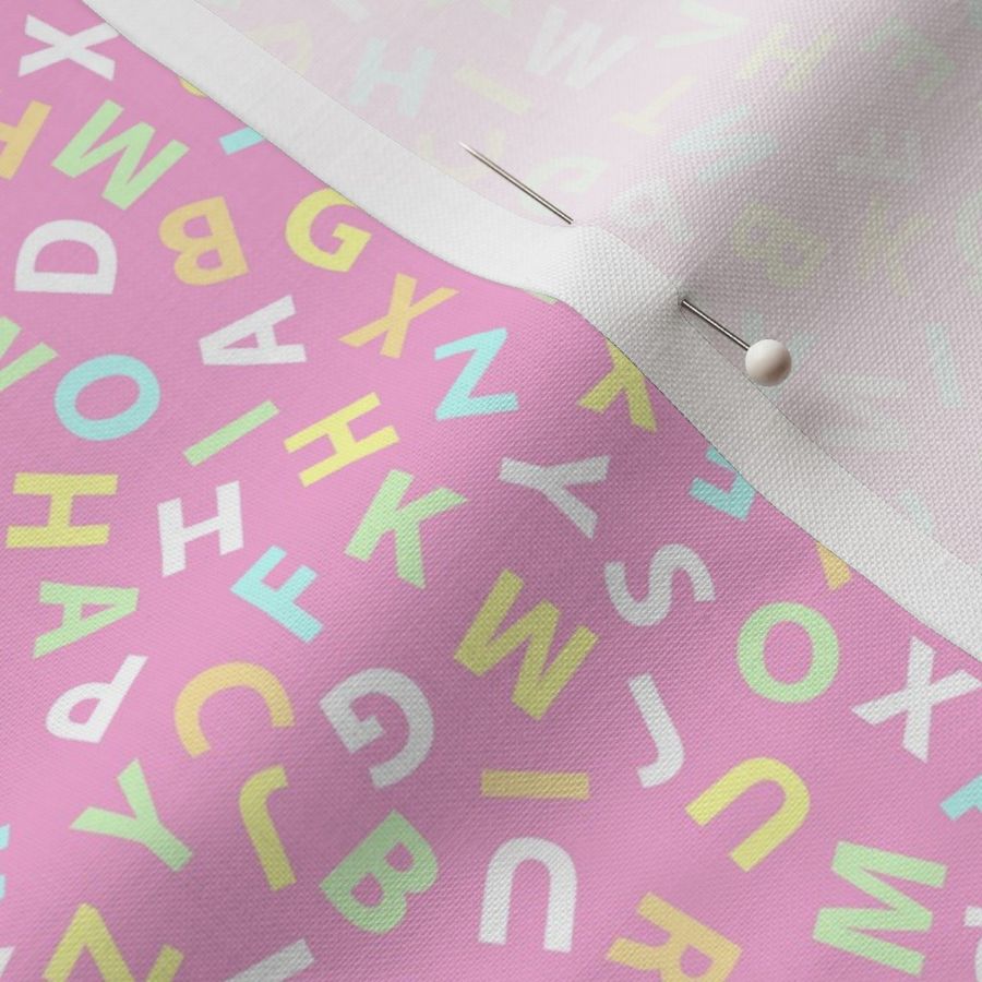 ditsy alphabet on pink