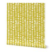 Pastel love brush sprinkles strokes stripes and spots hand drawn ink illustration pattern scandinavian style in mustard yellow