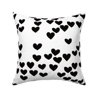 Pastel love hearts tossed hand drawn illustration pattern scandinavian style in neutral black and white