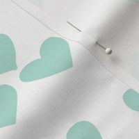 Pastel love hearts tossed hand drawn illustration pattern scandinavian style in soft mint