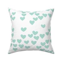 Pastel love hearts tossed hand drawn illustration pattern scandinavian style in soft mint