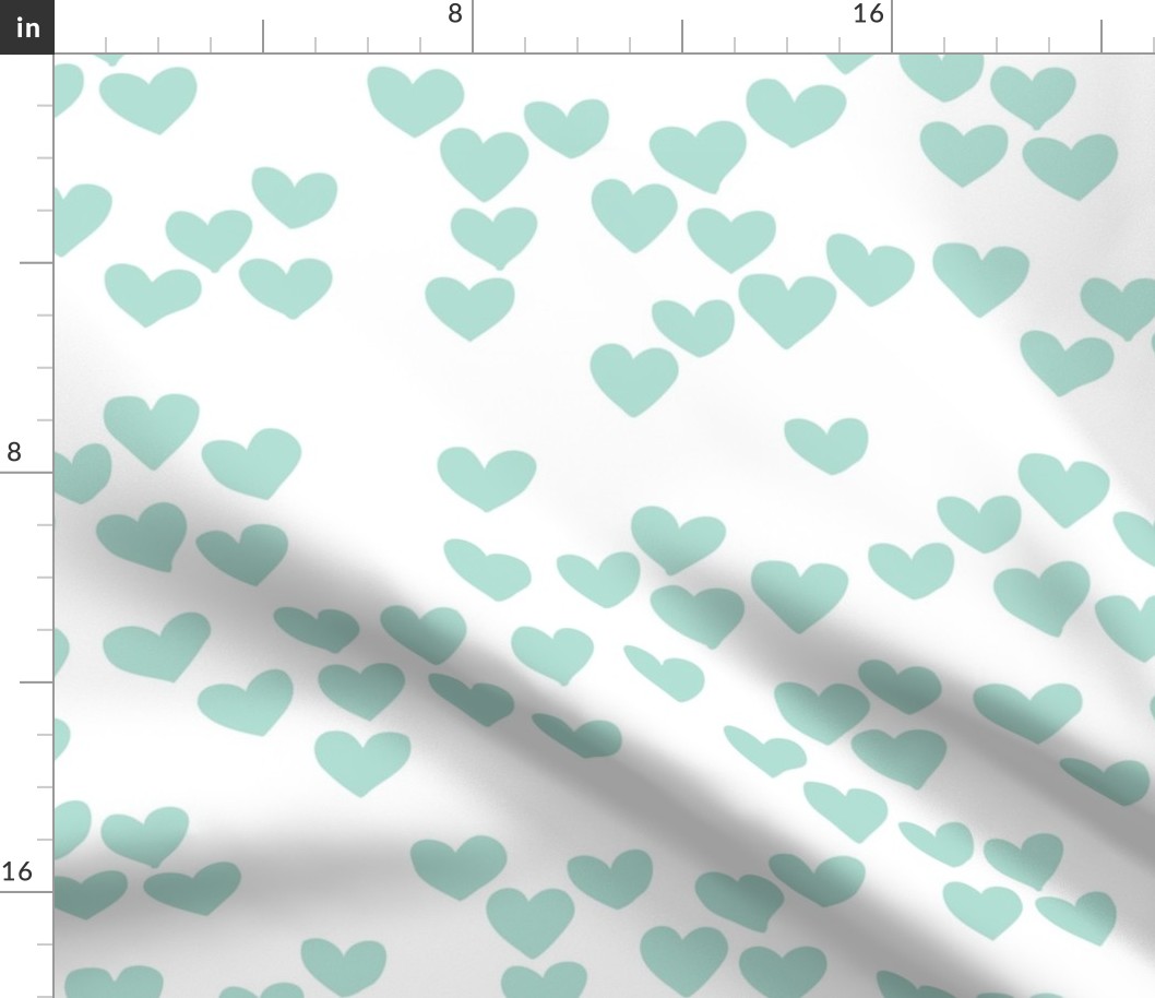 Pastel love hearts tossed hand drawn illustration pattern scandinavian style in soft mint