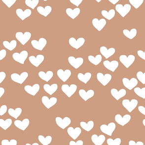 Pastel love hearts tossed hand drawn illustration pattern scandinavian style in soft ochre beige
