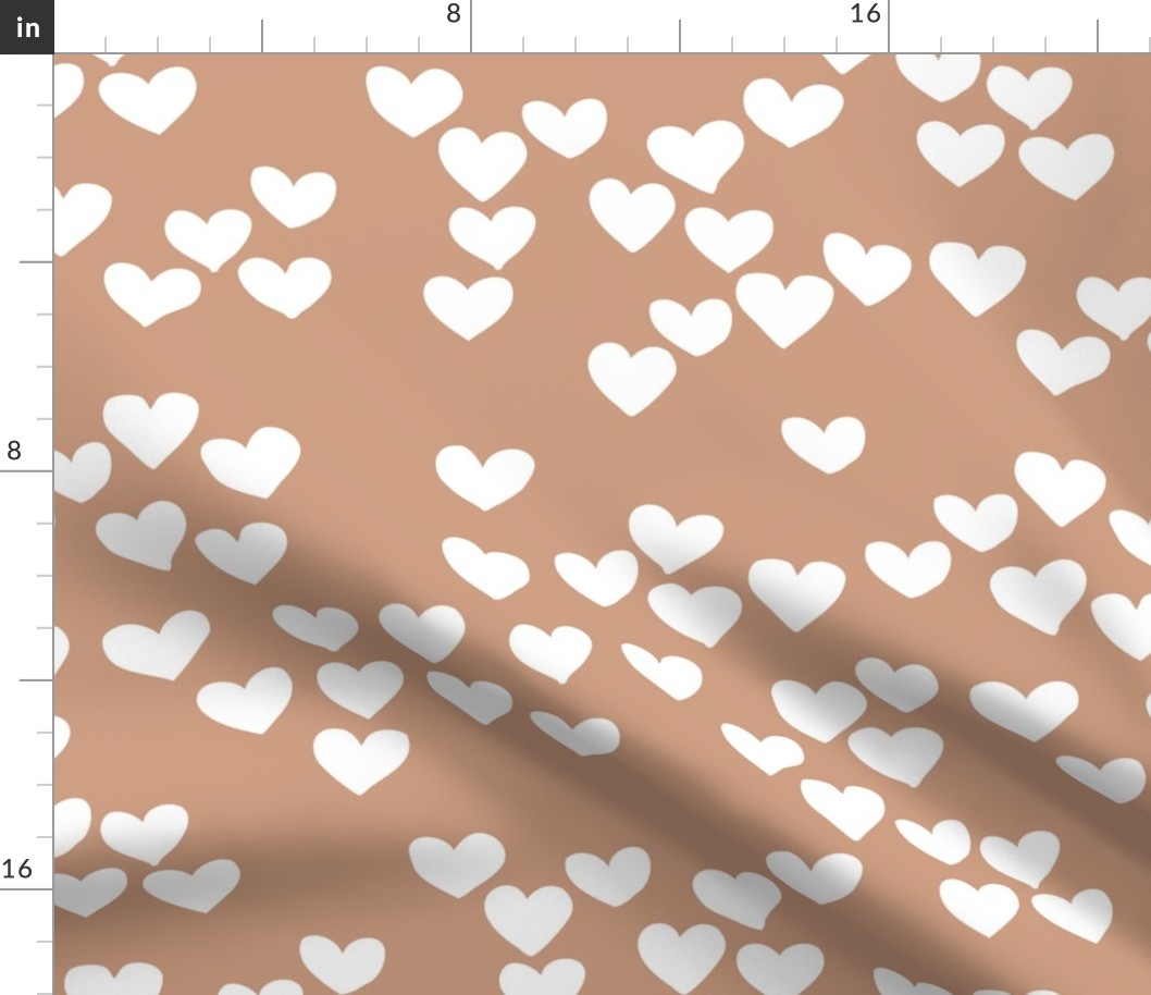 Pastel love hearts tossed hand drawn illustration pattern scandinavian style in soft ochre beige