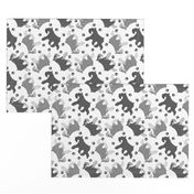 Trotting Miniature Schnauzers and paw prints - white