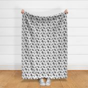 Trotting Miniature Schnauzers and paw prints - white