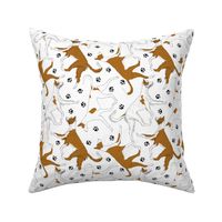 Trotting Ibizan hounds and paw prints - white