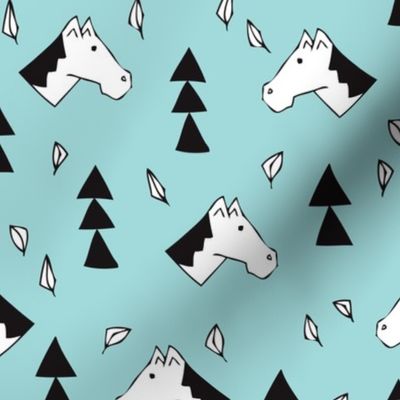 Sweet geometric horses cute animal drawing with triangles and little cowboy feathers in baby blue black and white