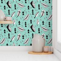 Cool geometric feathers and arrows abstract triangle hand drawn illustration scandinavian style in mint blue black and white