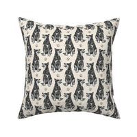 Small sitting Australian cattle dog - paw print sepia