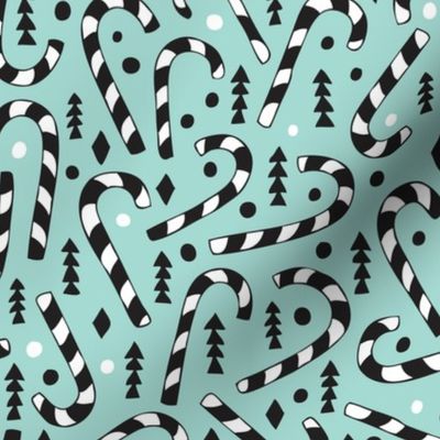 Christmas candy canes cool geometric seasonal illustration scandinavian style holiday theme in mint black and white