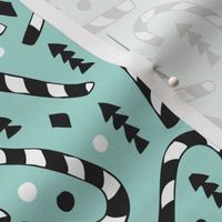 Christmas candy canes cool geometric seasonal illustration scandinavian style holiday theme in mint black and white