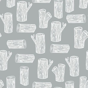 tree logs // grey white logs trees forest woodland 