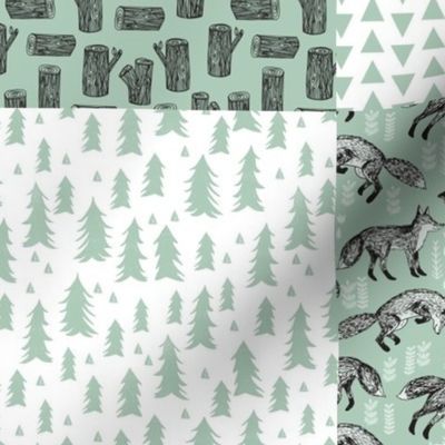 woodland cheater quilt // mint and white cute patchwork squares foxes nursery bear woodland arrows