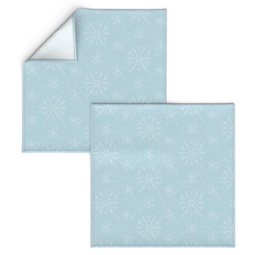 Cosmic Snowflakes on pale blue