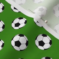 One Inch Black and White Soccer Balls on Apple Green