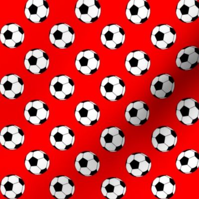 One Inch Black and White Soccer Balls on Red