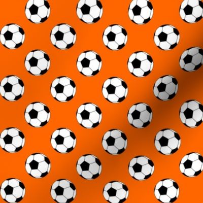 One Inch Black and White Soccer Balls on Orange