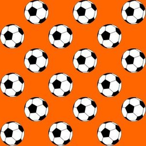 One Inch Black and White Soccer Balls on Orange