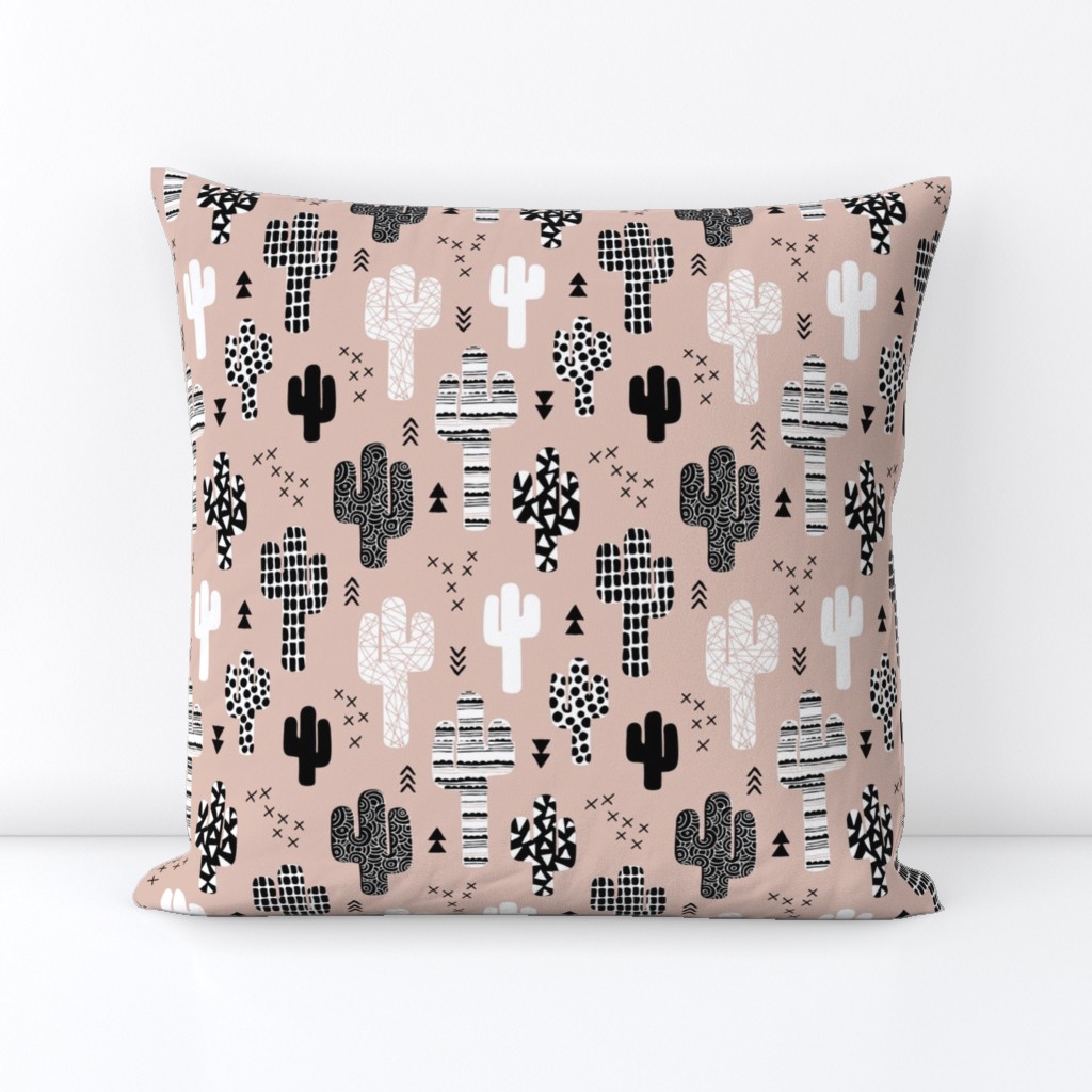 Cool western geometric cactus garden with triangles and arrows gender neutral beige black and white