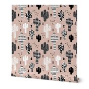 Cool western geometric cactus garden with triangles and arrows gender neutral beige black and white