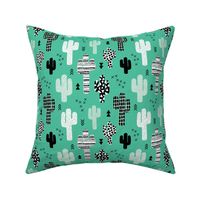 Trendy western geometric cactus garden with triangles and arrows gender neutral mint black and white